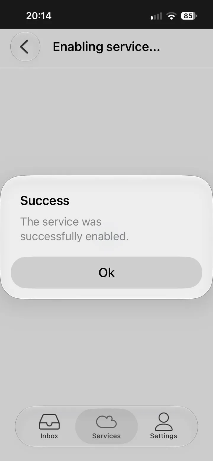 The app’s Success dialog: “The service was successfully enabled.”